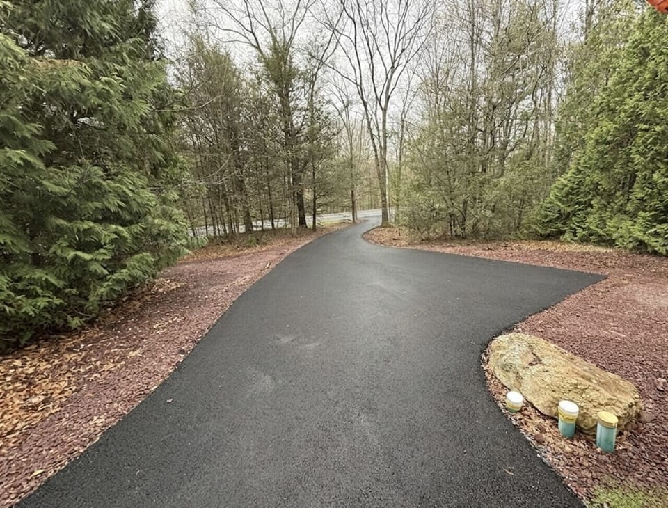 Enter the paved driveway.