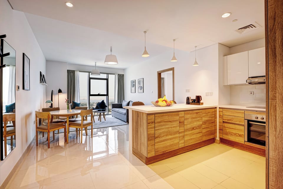 One Bedroom Sea View | Living area | 55-inch Smart TV with satellite channels