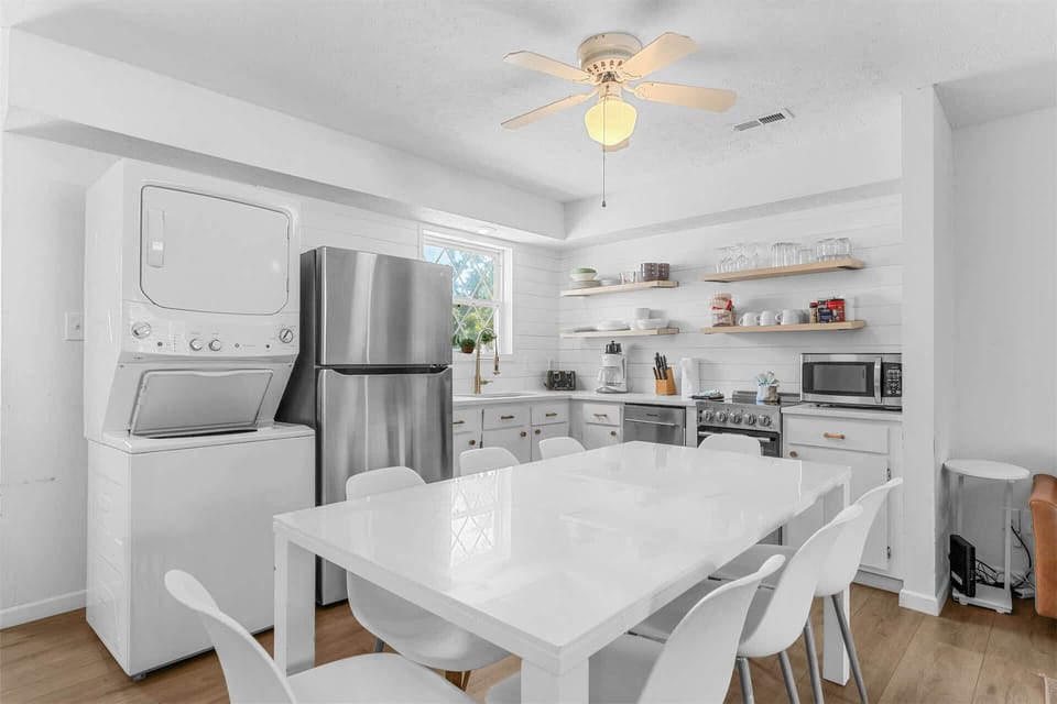 Gather for meals together at the dining table, with seating for 8