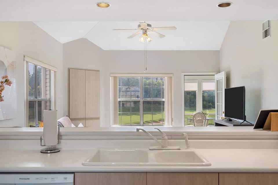 Open concept offers views of the outdoors while in the kitchen