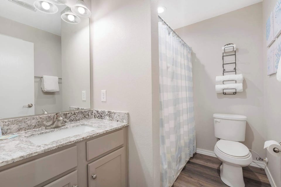 Bathroom 1 shared with shower/tub combo