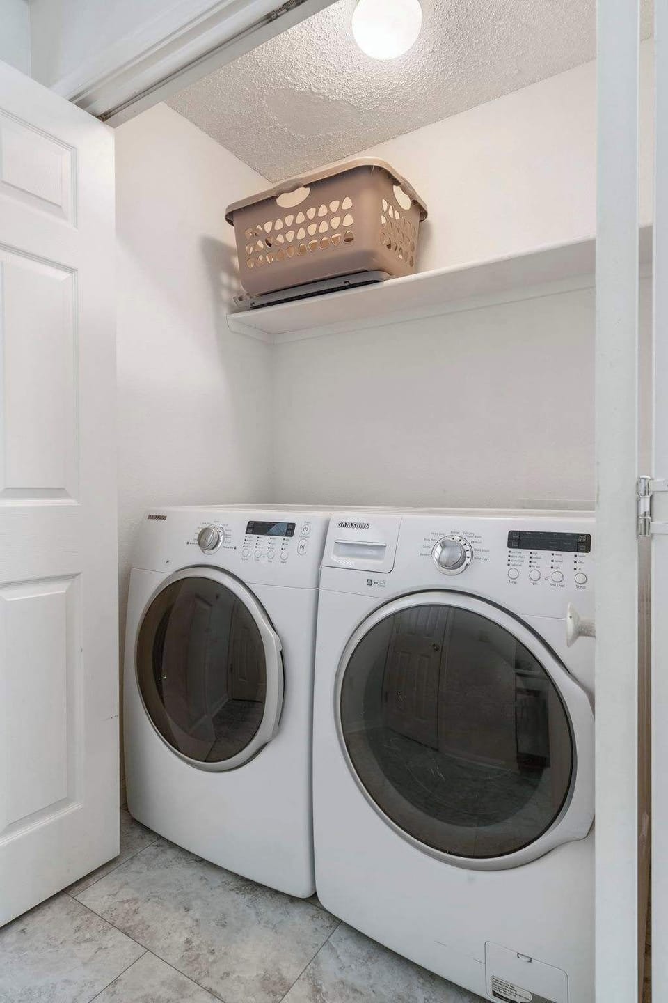 Laundry closet off of the the kitchen