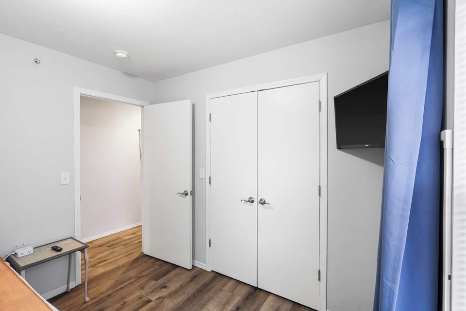 The second bedroom features a twin-over-full bunkbed & Smart TV