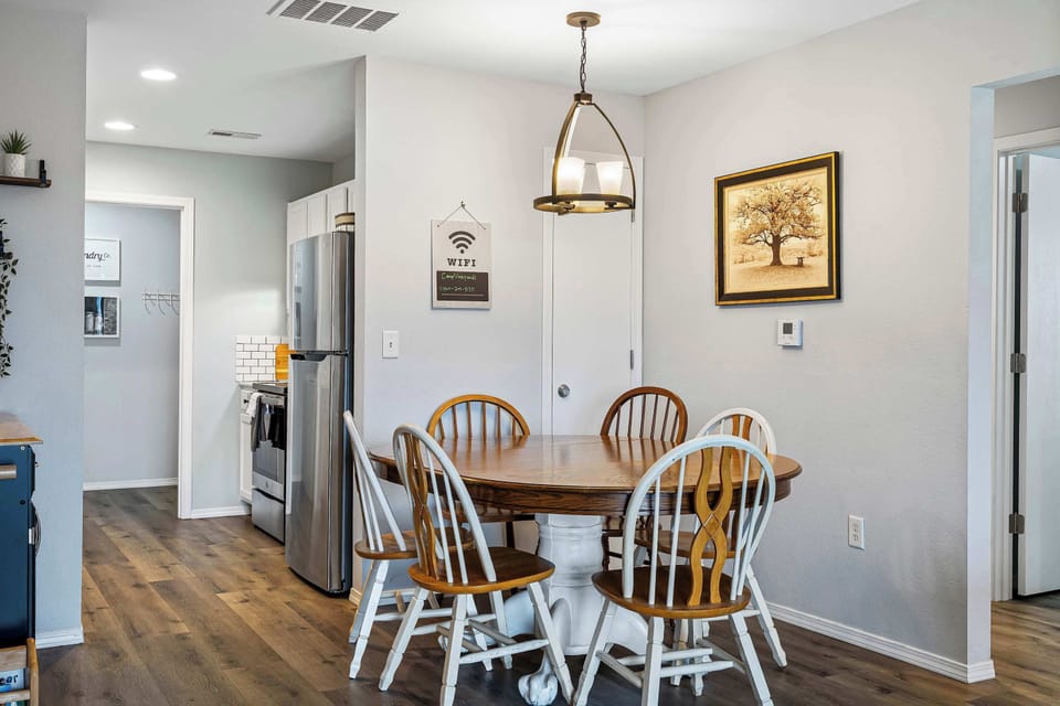 Gather for cozy meals together at the dining table, with seating for 6