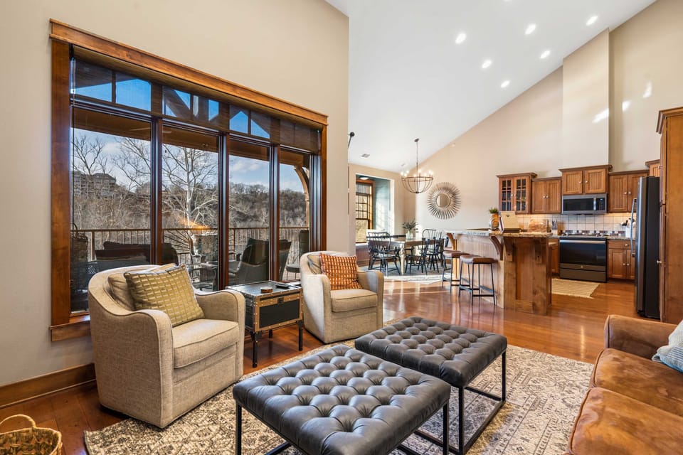Bright living space with ample seating and TV