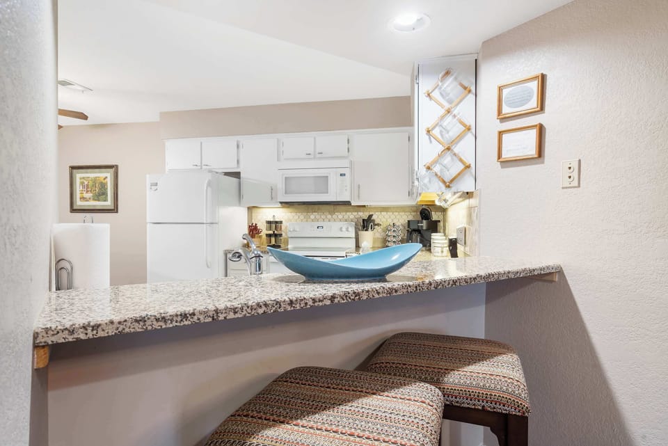 Additional bar stool seating for 2 at the kitchen counter