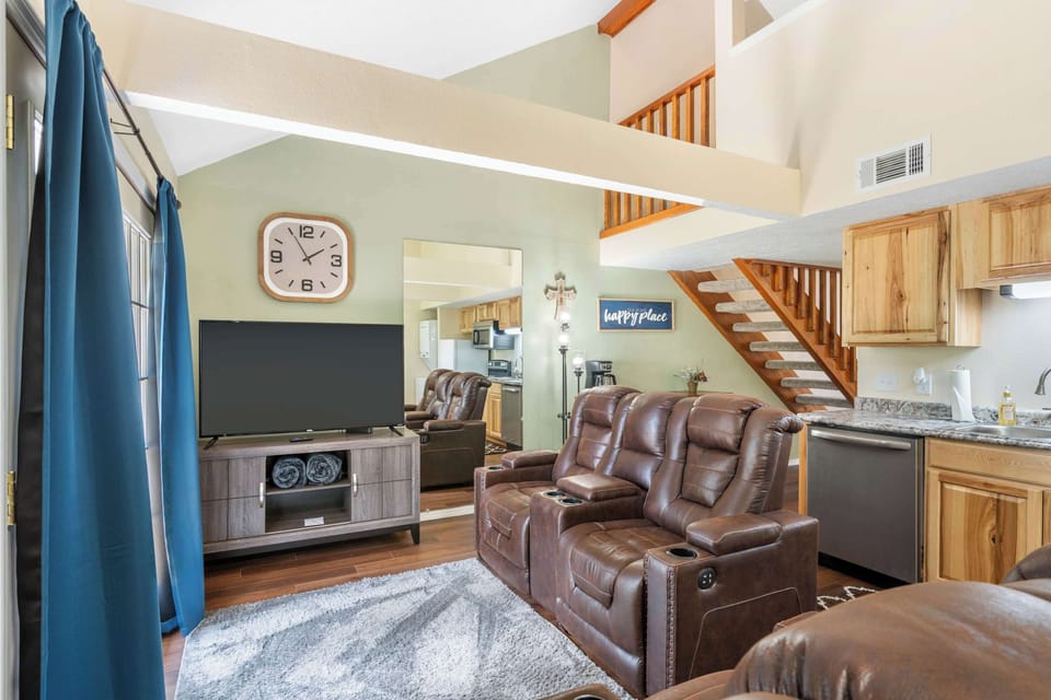 Curl up in the airy living room & stream your favorites on the smart TV