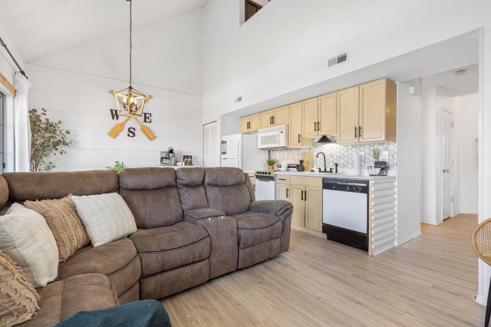 Cozy and spacious living area with TV