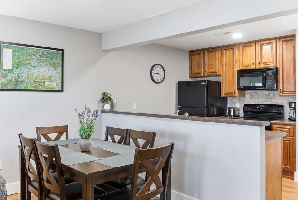 The spacious kitchen offers ample space & all the comforts of home and dining table for 6