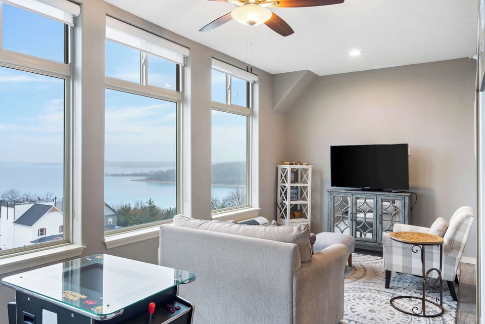The sunroom offers a picturesque backdrop for enjoying movies & gaming