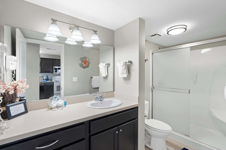Enjoy an oversized vanity & glass shower in the second full bathroom