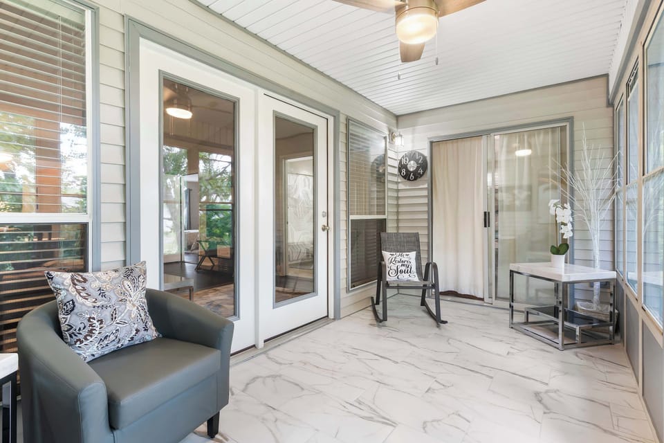 Lounge the day away with views & a great book in the tranquil sunroom