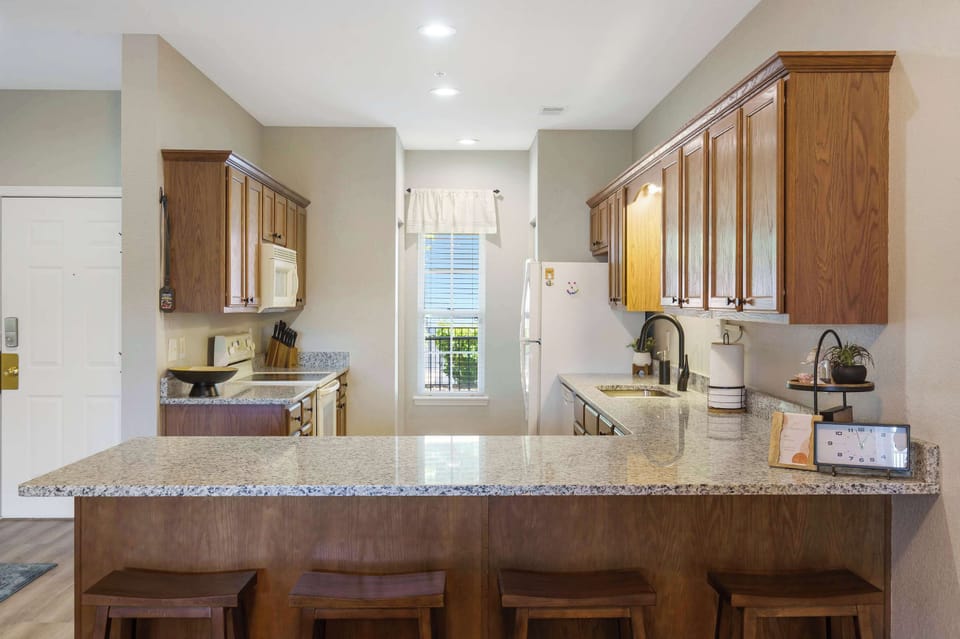 Bar stool chairs along the countertops