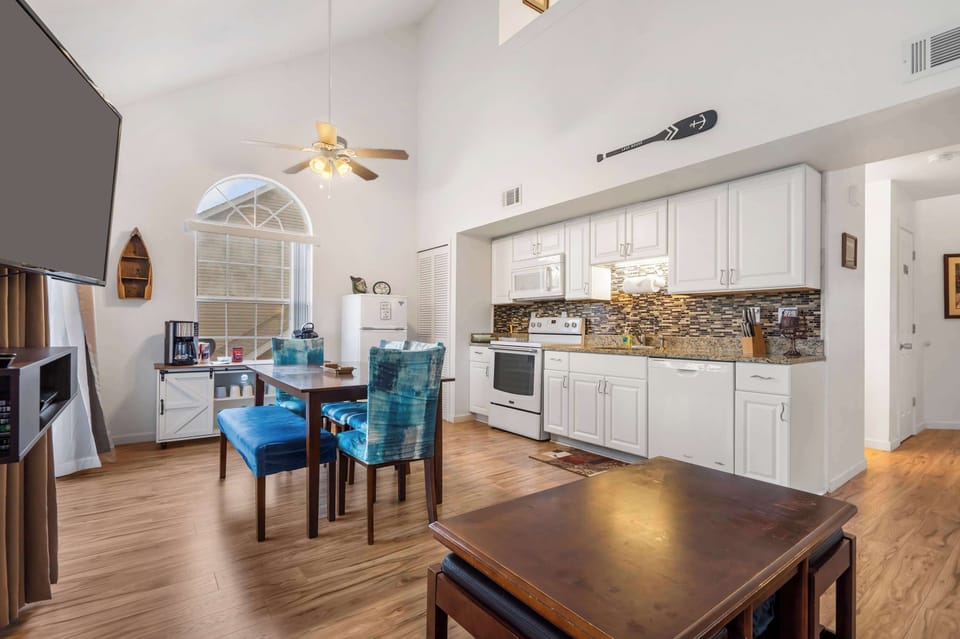 Curl up in the open living room & enjoy a movie with gorgeous water views