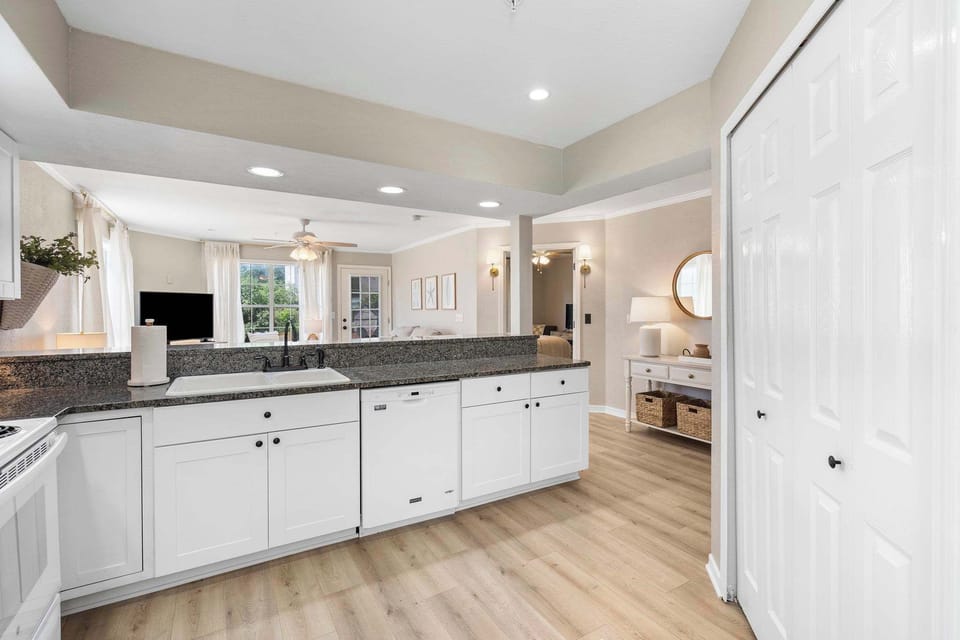 The open, well-equipped kitchen offers plenty of storage & counter space