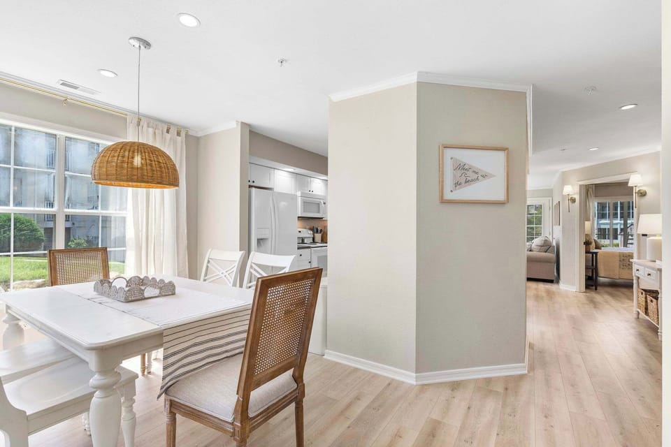 Enjoy the open, breezy flow between the dining room, kitchen, & living room