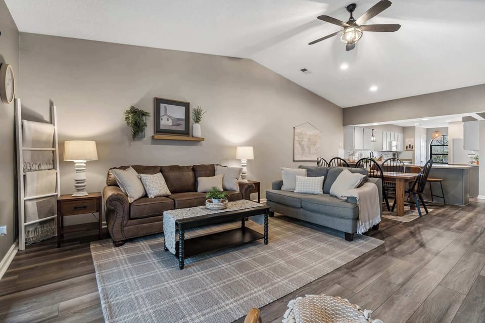 Cozy and spacious living area with TV