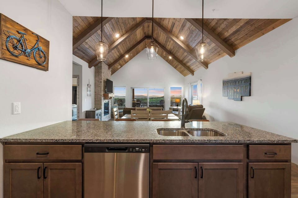 The sophisticated kitchen offers ample space & all the comforts of home