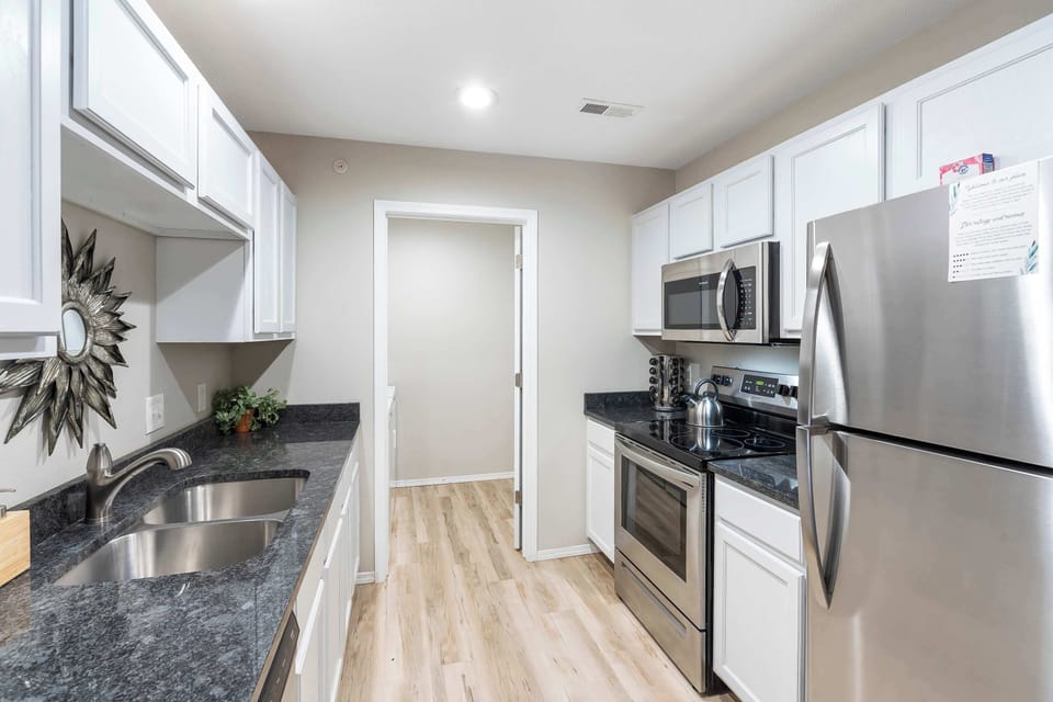 The airy kitchen offers ample space and all the comforts of home