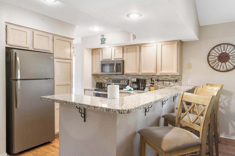 Kitchen bar counter with seating for 3
