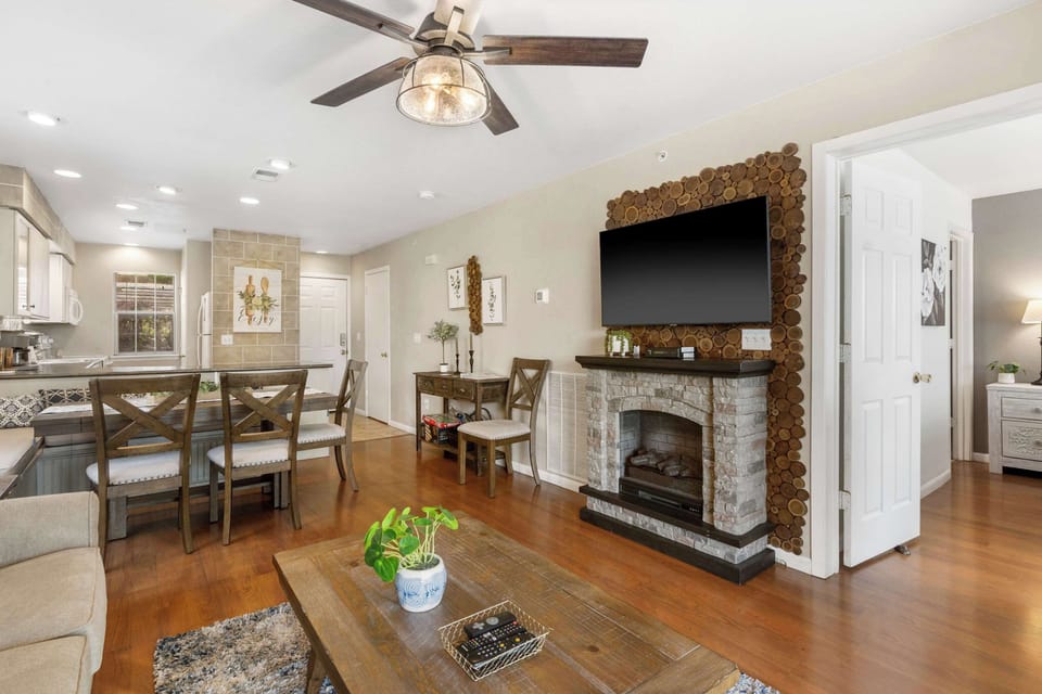 Cozy and spacious living area with TV