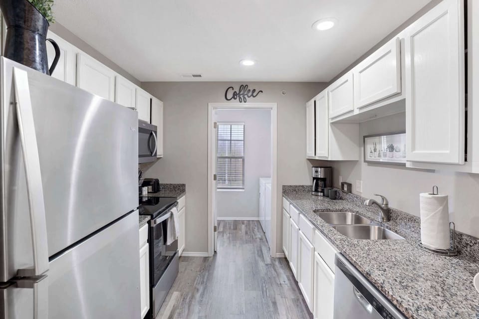 Full kitchen with stainless-steel appliances