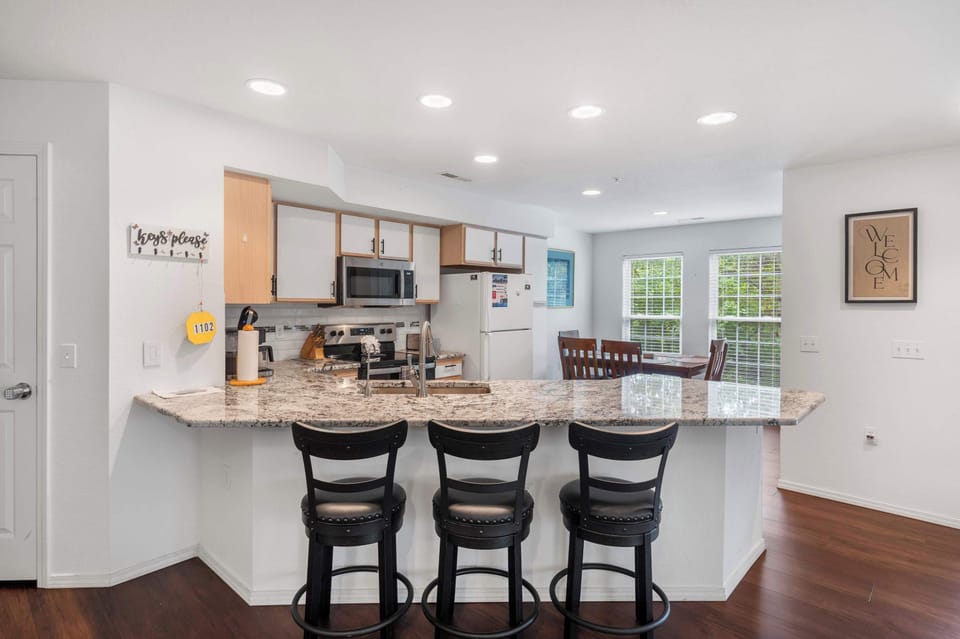 Sip morning coffee or grab a bite at the kitchen counter, with seating for 3