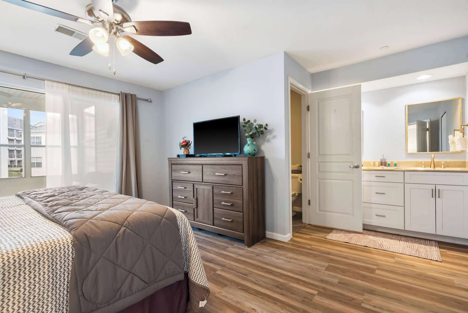 The sophisticated king suite boasts a private ensuite, TV, & deck access