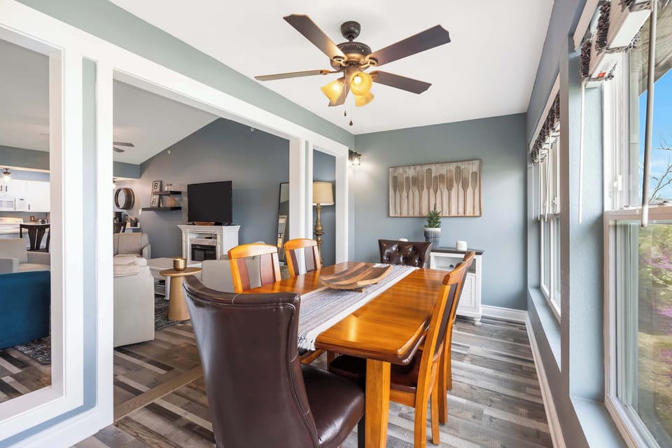 Gather for elegant meals together at the dining table, offering seating for 6