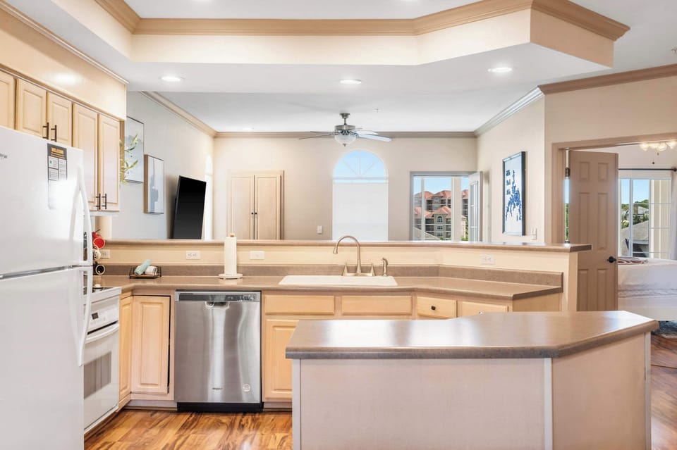 The open kitchen offers ample space & is well-equipped for your visit