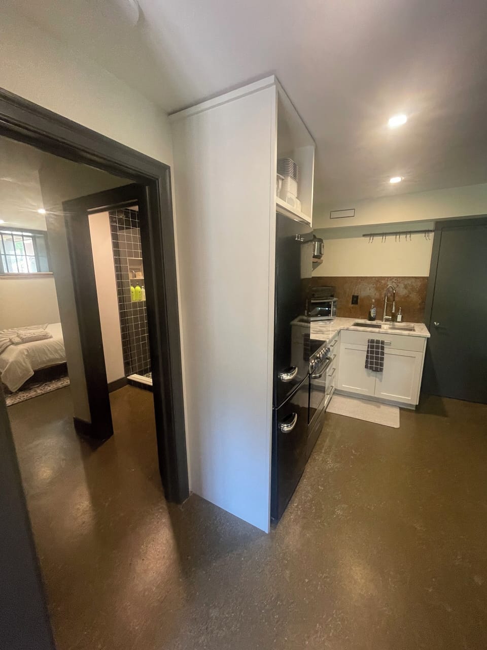 Kitchen and entry to Bedroom