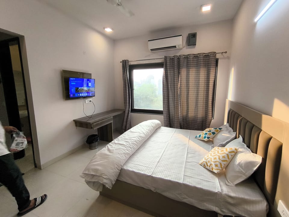 Deluxe Double Room, Garden View | In-room safe, desk, laptop workspace, blackout drapes