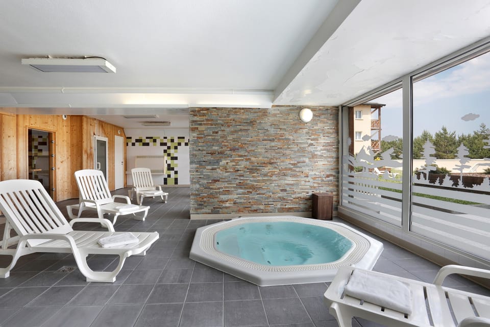 Visit the paid wellness centre and soak sore muscles in the indoor hot tub.