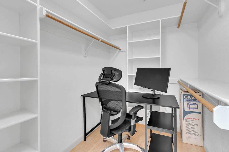 Master Walk in closet with desk space
