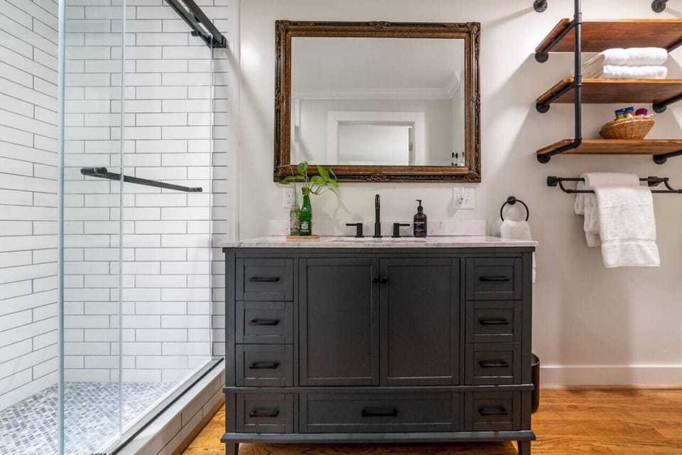 Beautifully renovated bathroom with tiled walk in shower. Towels, shampoo, conditioner and body wash are provided.
