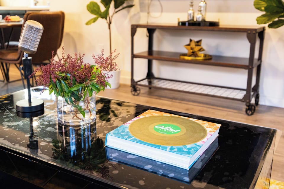 Stylish vignette with curated décor, adding a modern, welcoming touch to the living space.
