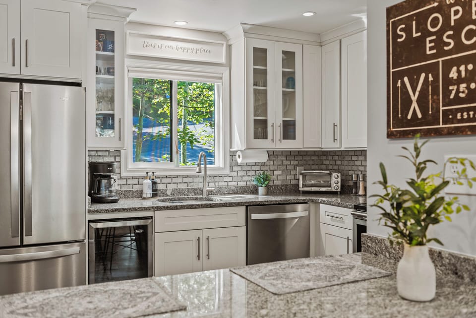 Stainless steel appliances and granite countertops.