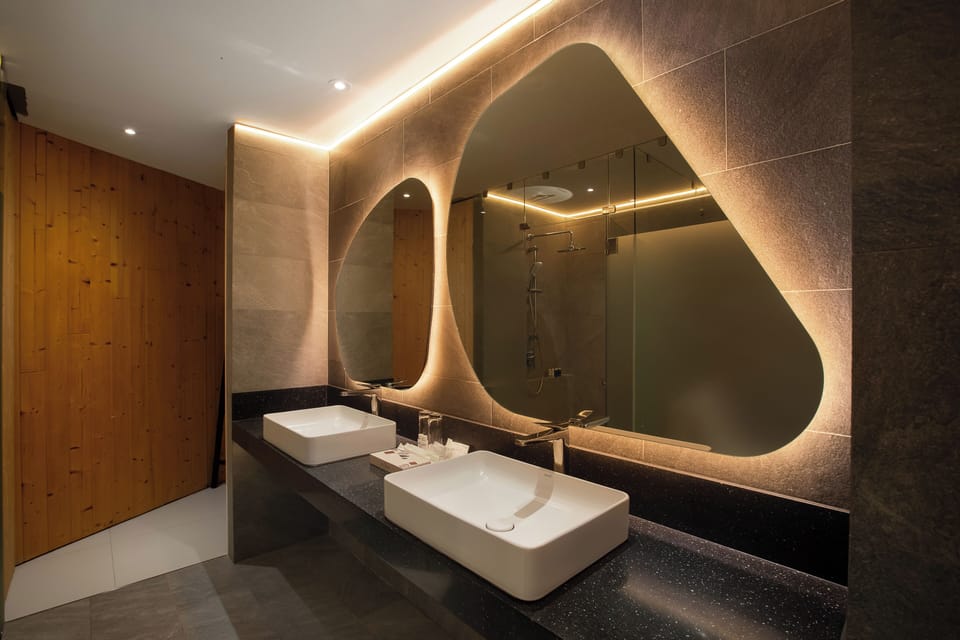 Family Suite | Bathroom | Hair dryer, slippers, towels, soap