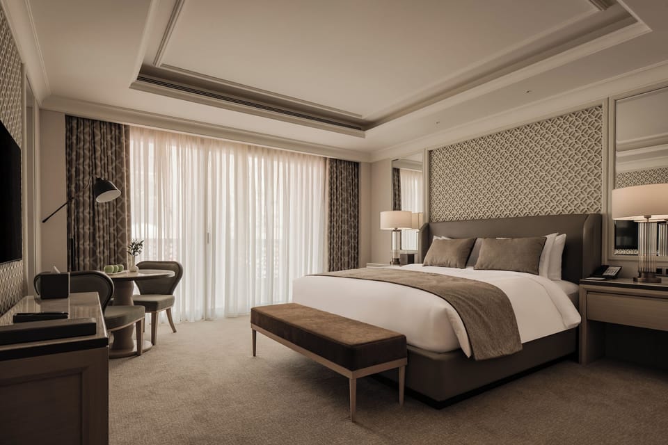Suite, 1 King Bed, Accessible, City View | Minibar, in-room safe, blackout drapes, rollaway beds