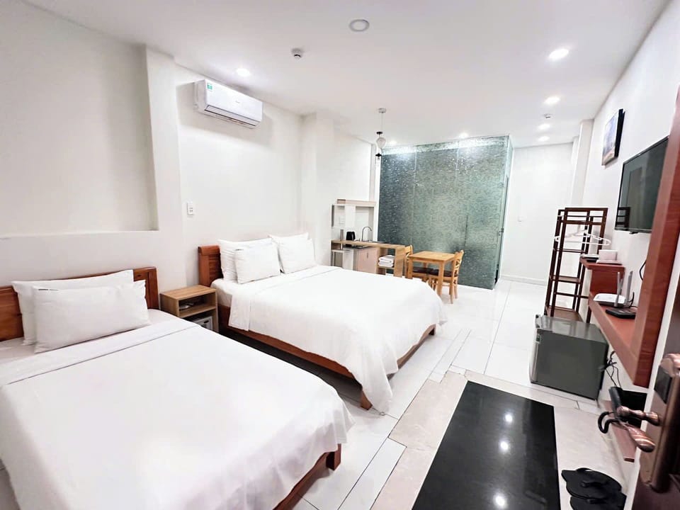 Family Triple Room | Living area | TV, printers