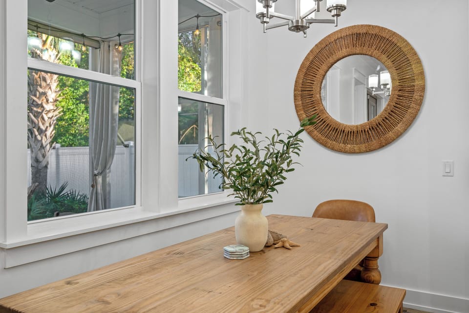 Beautiful wooden dining table with bench seating.