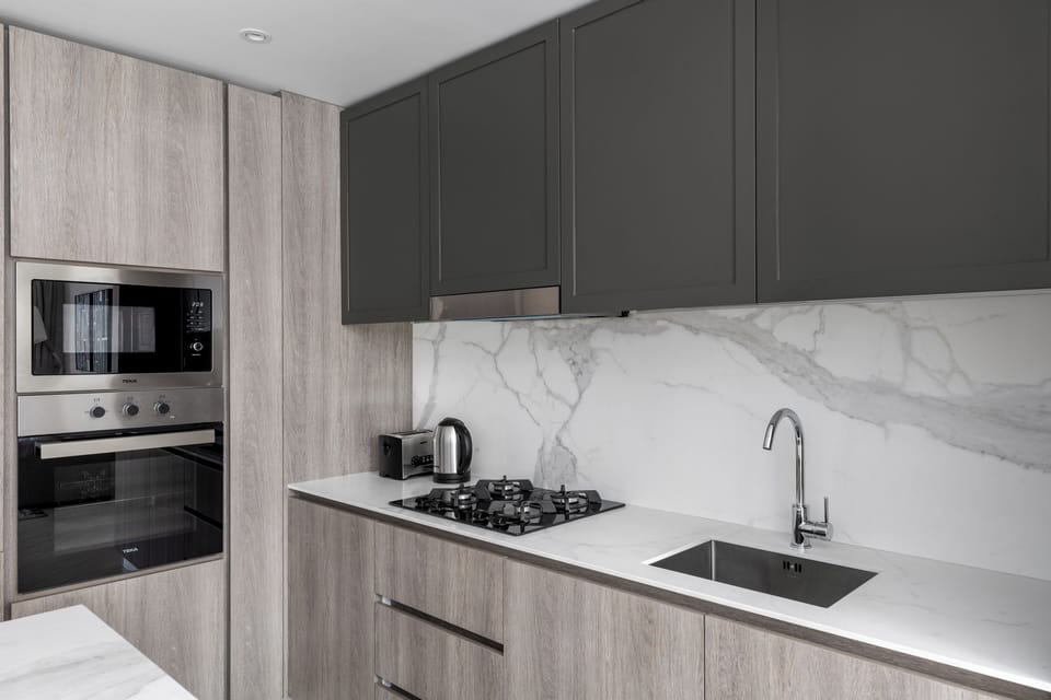 Deluxe Apartment, Balcony | Private kitchen | Fridge, microwave, oven, stovetop