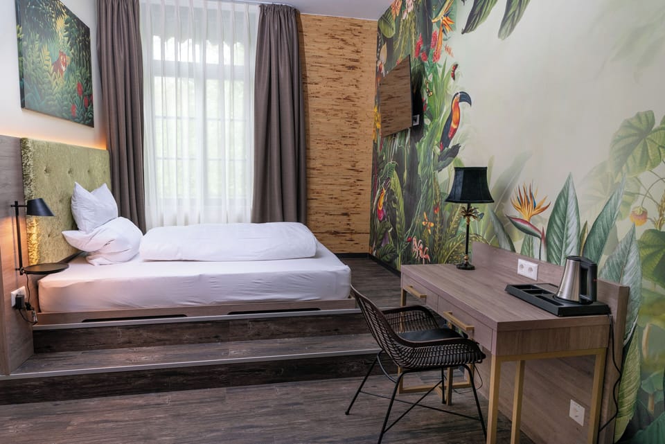Superior Double Room, Non Smoking, Private Bathroom | In-room safe, individually decorated, desk, blackout drapes