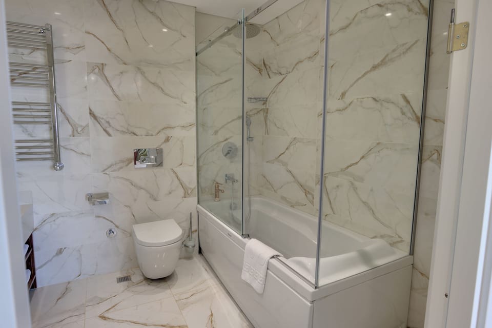 Grand Suite, Balcony, Sea View | Bathroom | Shower, hair dryer, bathrobes, towels