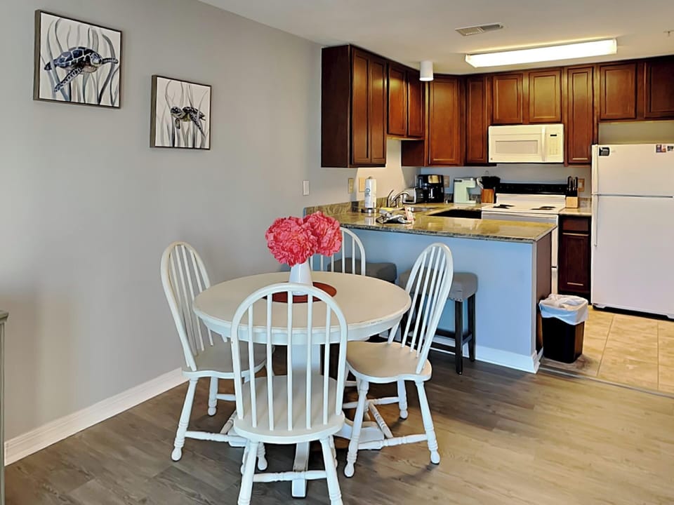 Dining Area - Table Seats Four, Breakfast Bar Seats Two