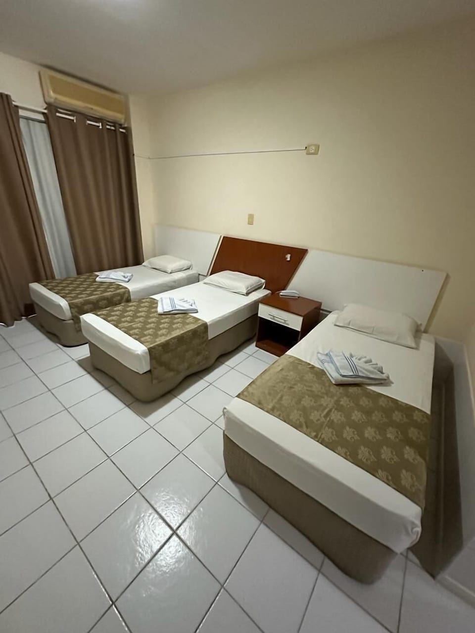 Standard Triple Room, Balcony | Desk, laptop workspace, blackout drapes, free WiFi
