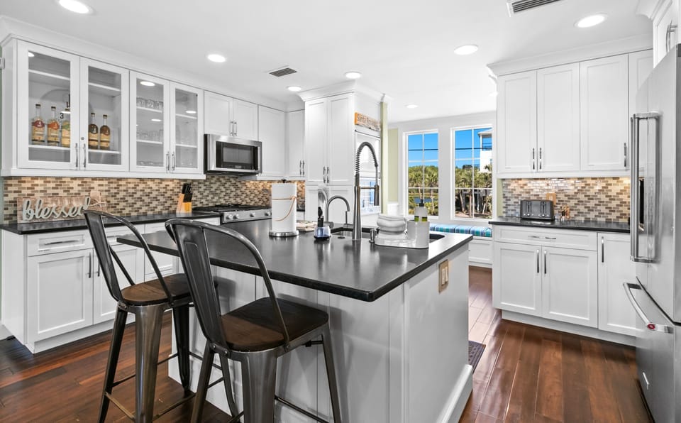 Kitchen is well stocked with stainless steel appliances
