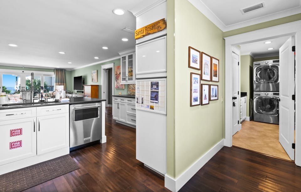 Laundry room with HE washer and dryer featured