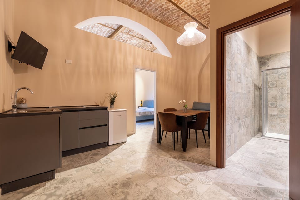 Family Suite, 1 Bedroom, Kitchenette, Ground Floor | Living area | TV