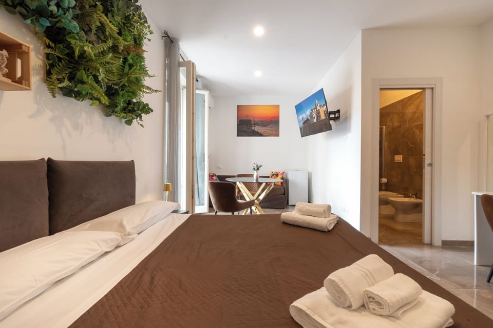 Family Quadruple Room, Balcony, Courtyard View | Hypo-allergenic bedding, down comforters, memory foam beds